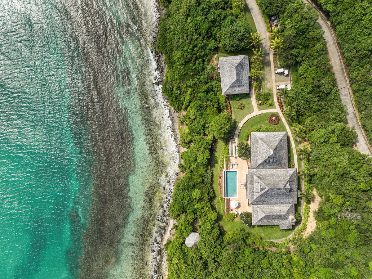Beach House, from the air, the villa and the reef
