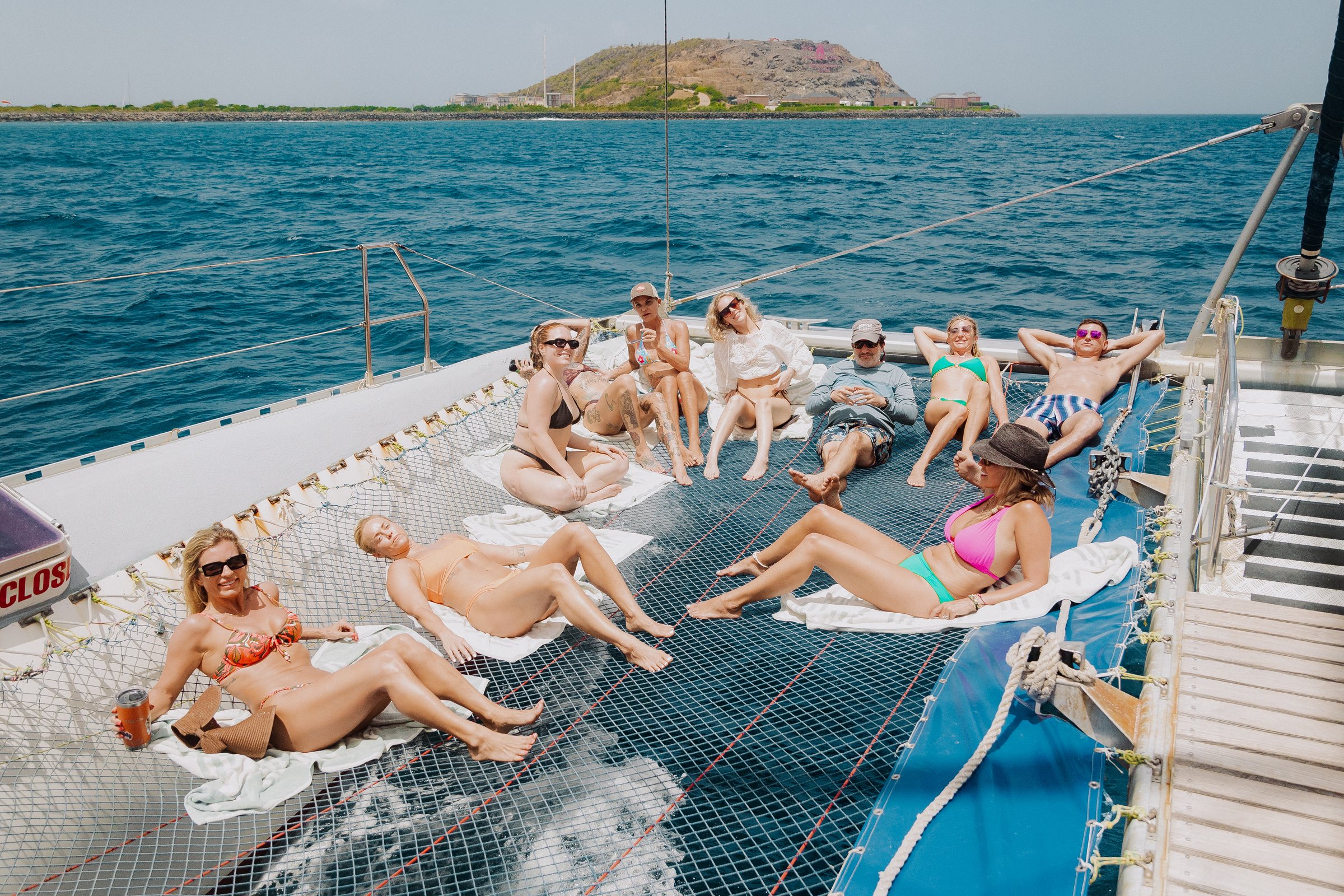 A group on the nets of a catamaran off Canouan