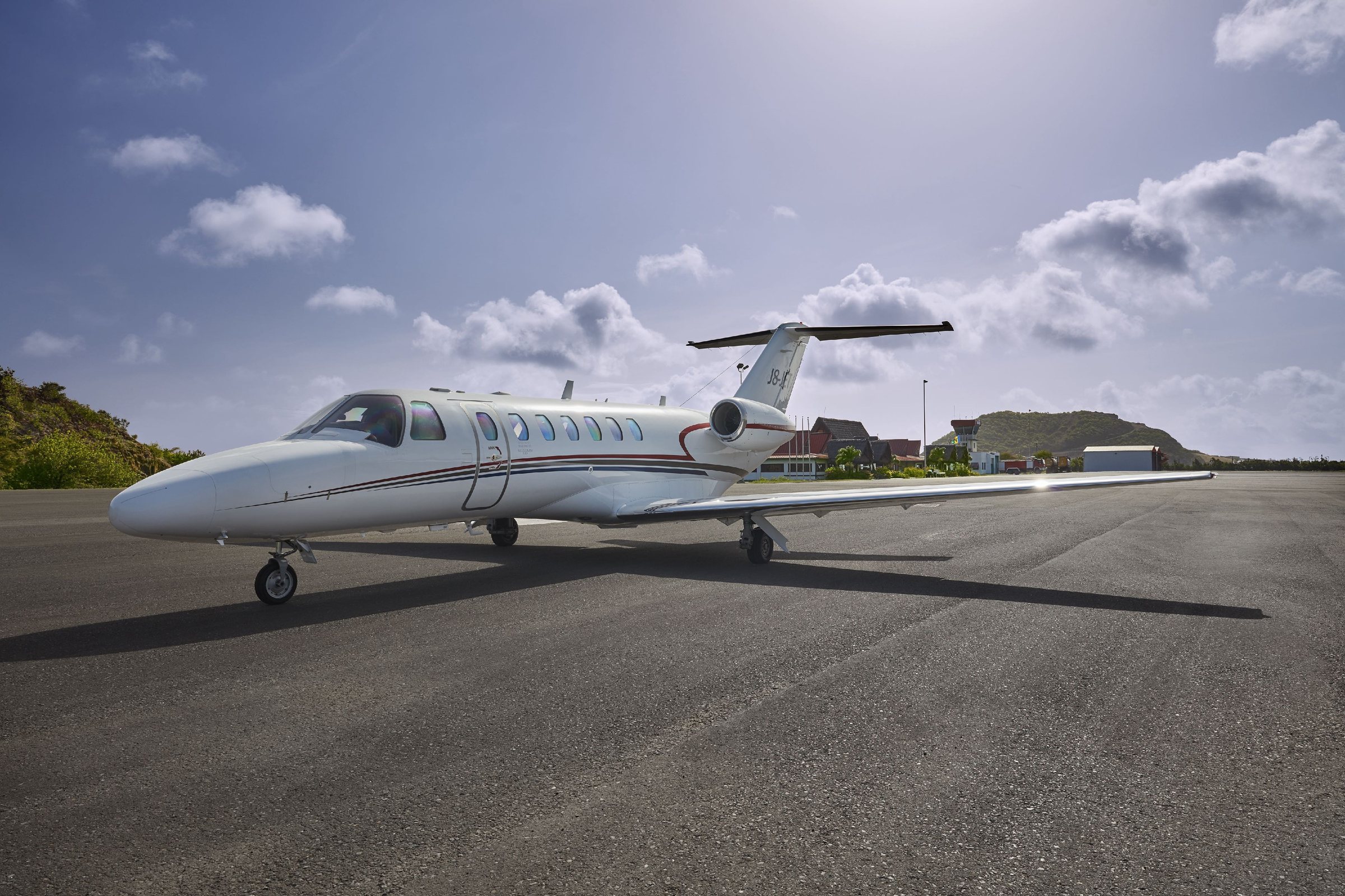 A private jet on the runway at Canouan Airport