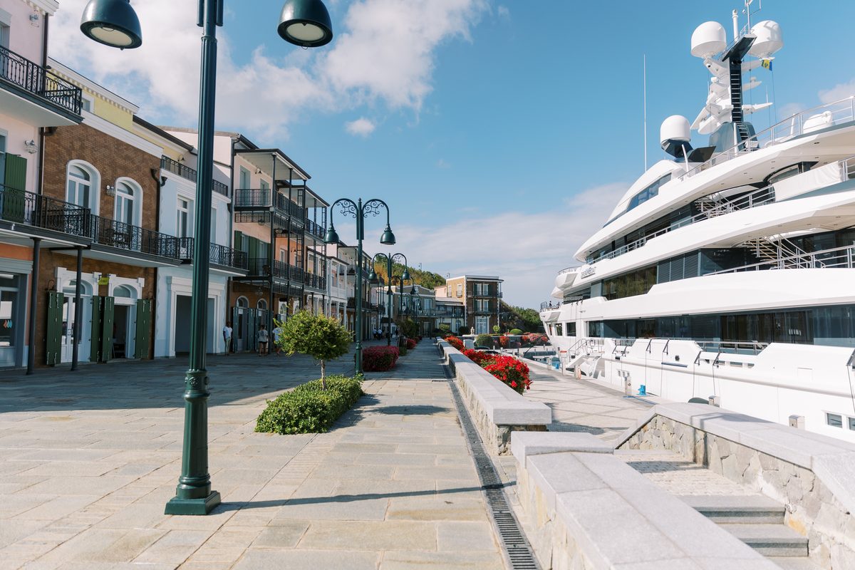 The promenade at Sandy Lane Yacht Club, a superyacht alongside