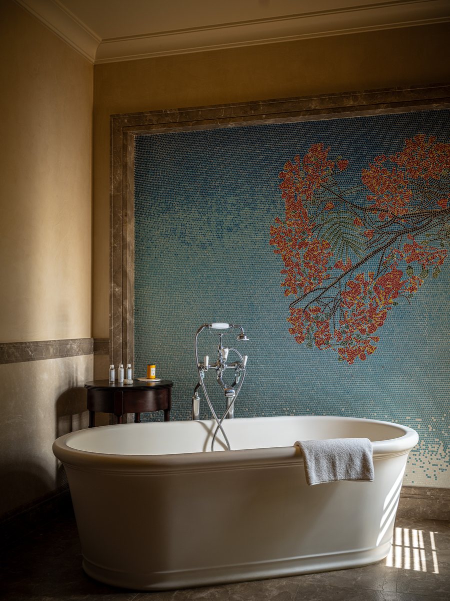 Turtle Creek, a bathroom with a freestanding bath