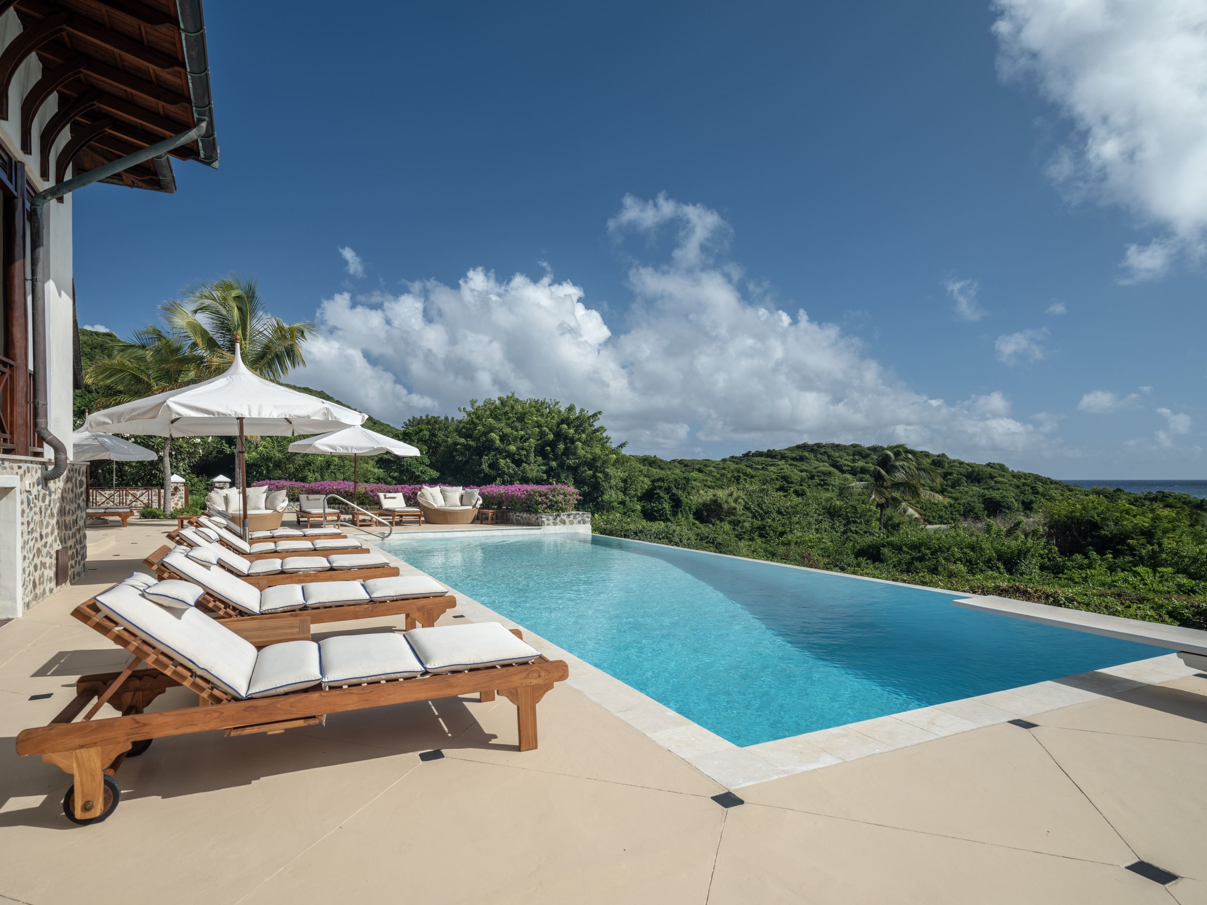 Big Blue Ocean, the pool and the villa